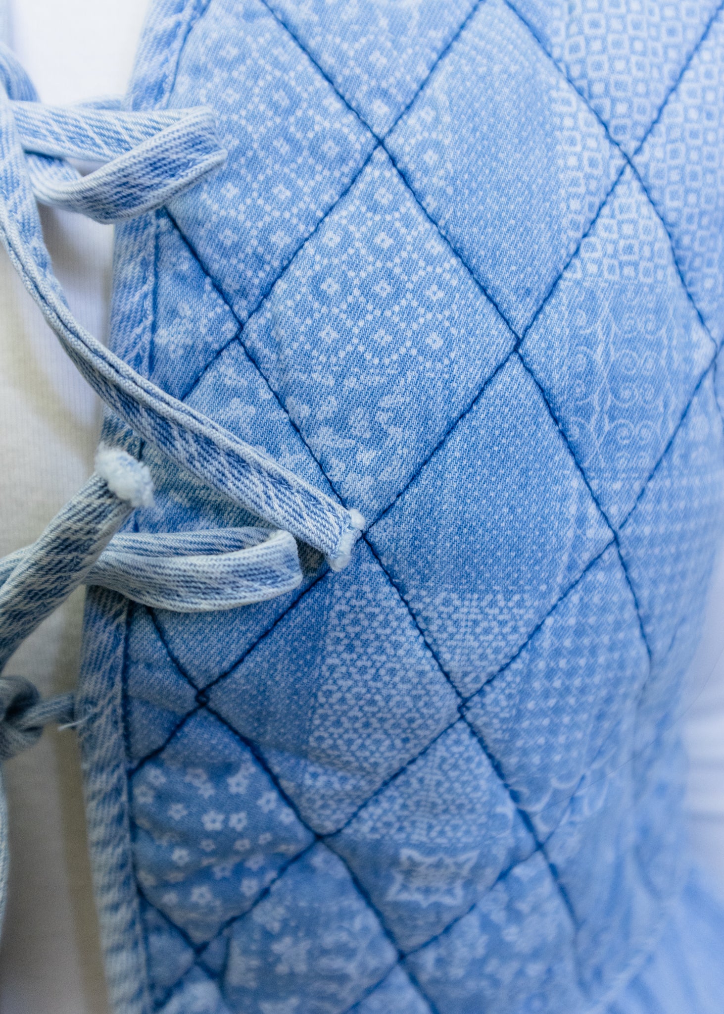 Denim Floral Quilted Ruffle Vest